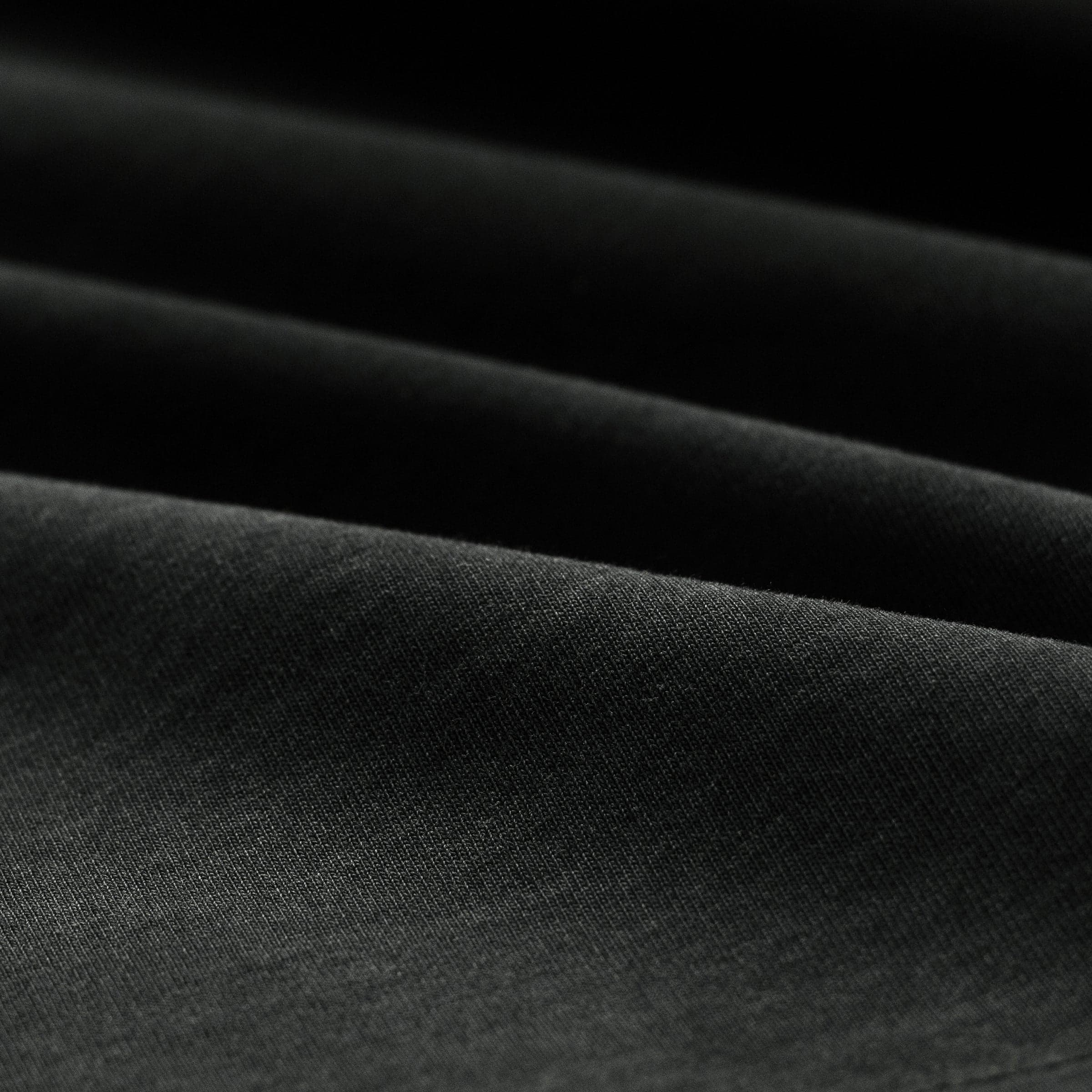 Aeterna Filigree media image showing dark washed fabric drape close-up detail