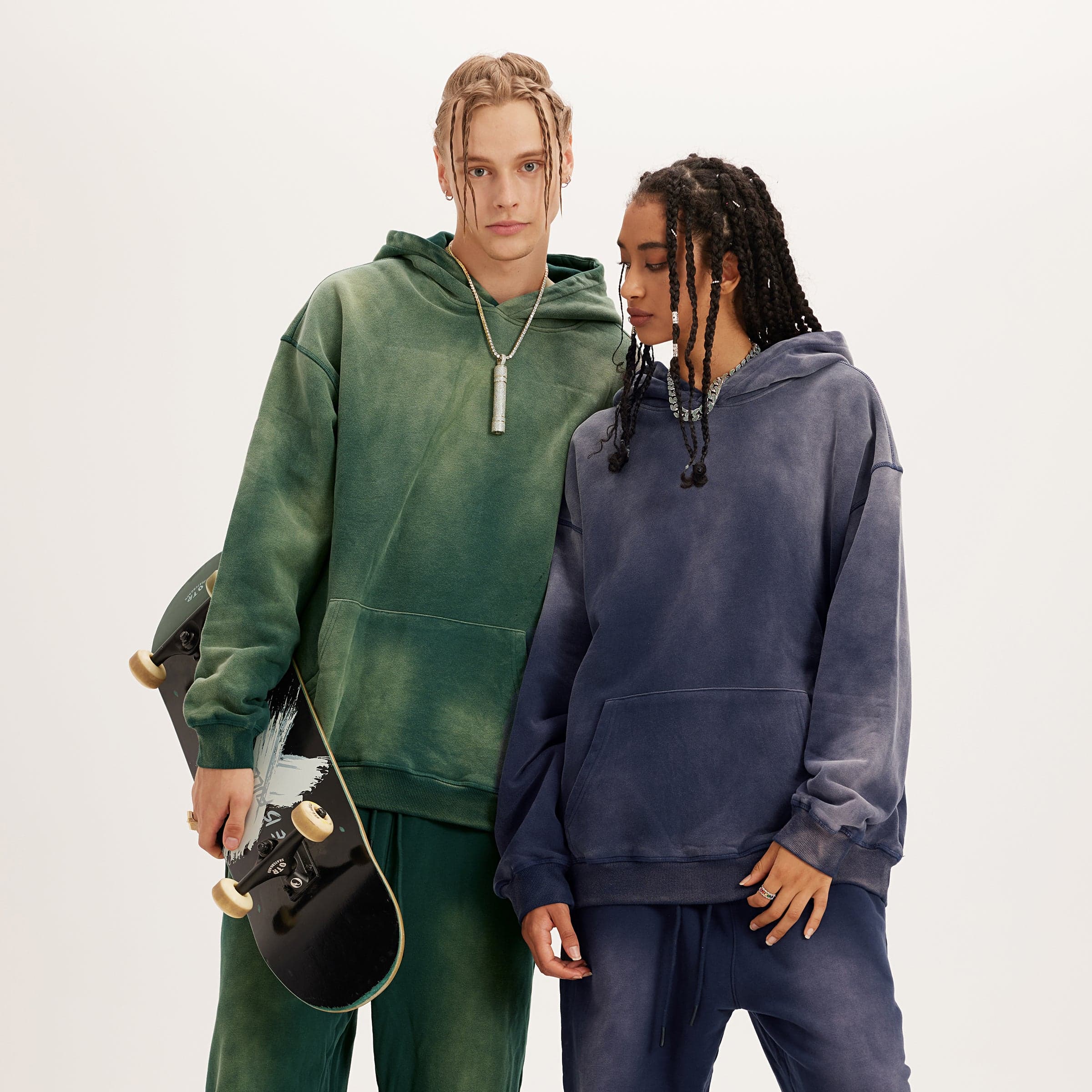 Aether Rune oversized graphic hoodie fit comparison on two models wearing green and navy hoodies