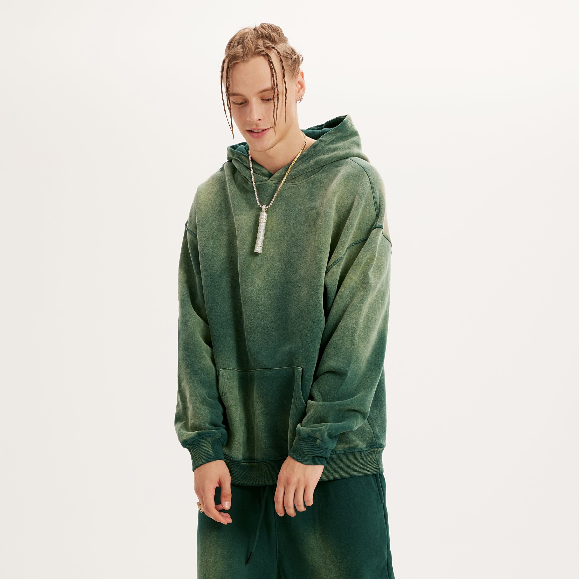Aether Rune oversized graphic hoodie male model front angled fit view in washed green