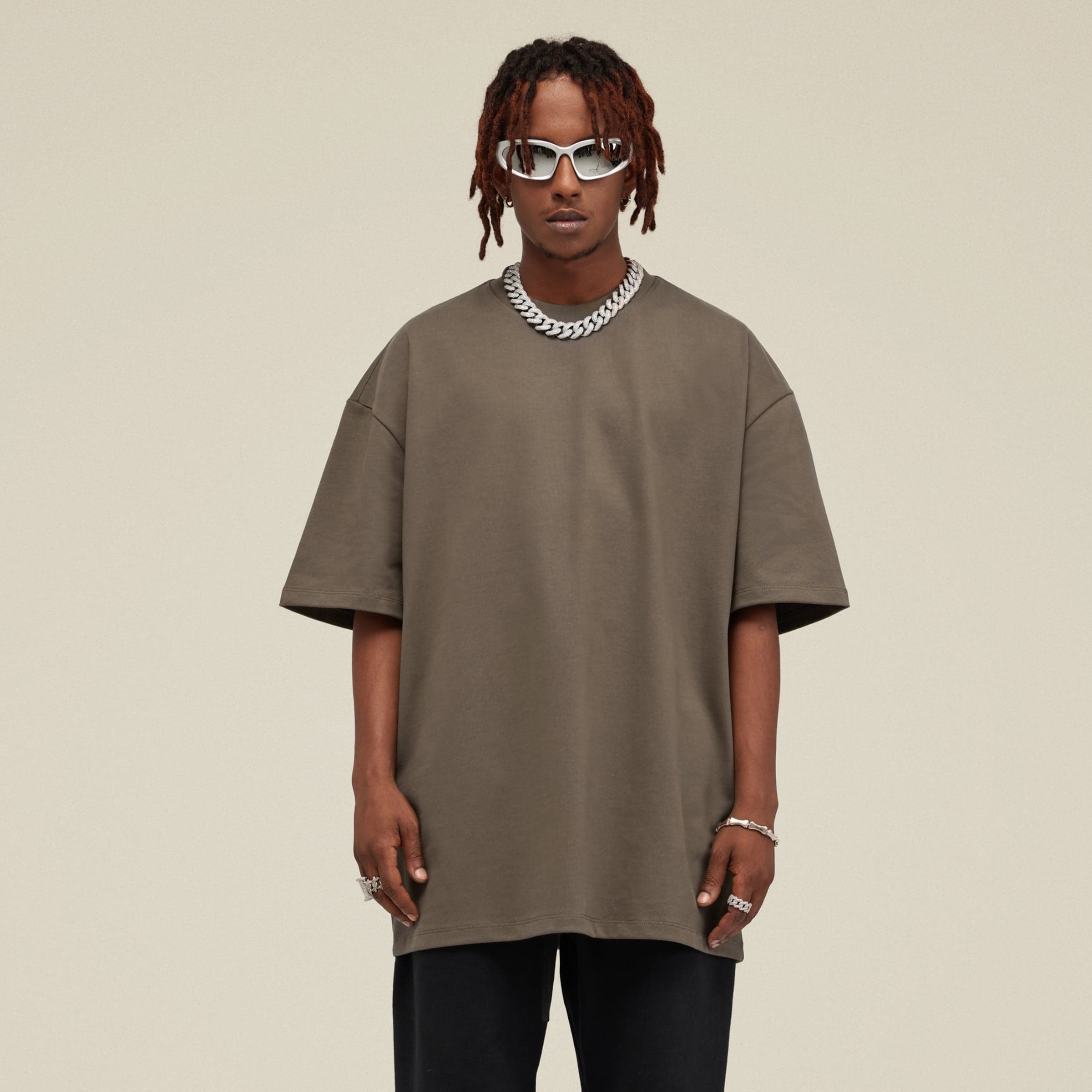 Astra oversized graphic tee worn by a male model (pictured).