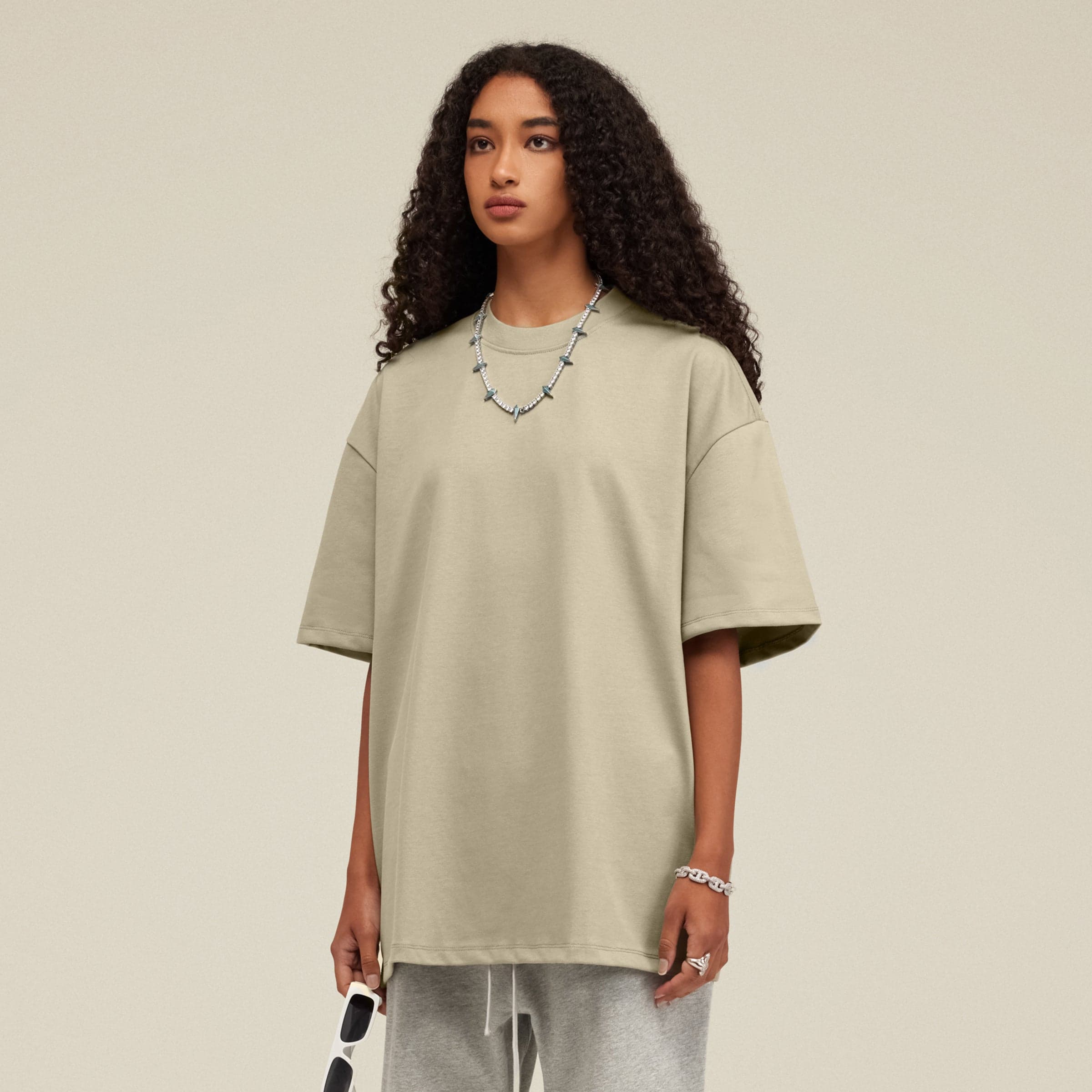 AURA oversized graphic tee female model angled front fit view