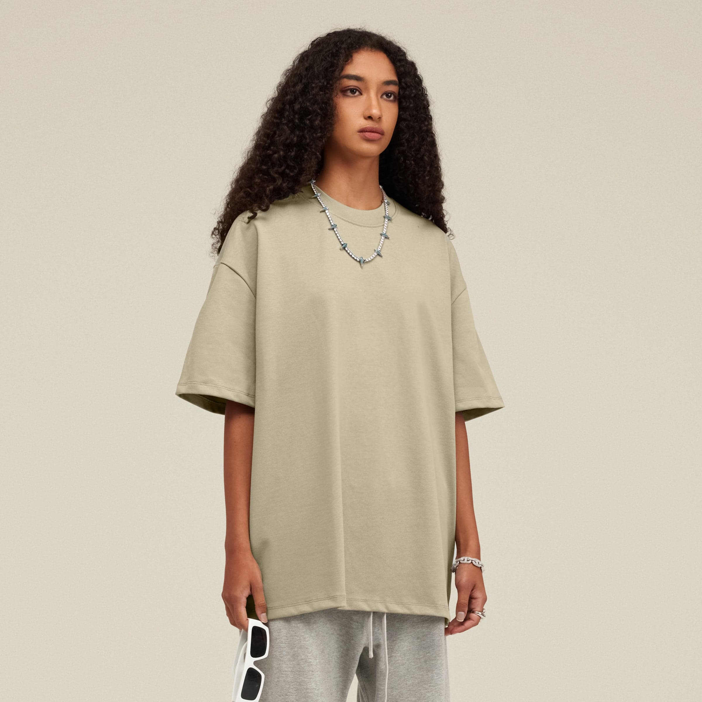 AURA oversized graphic tee female model standing front view