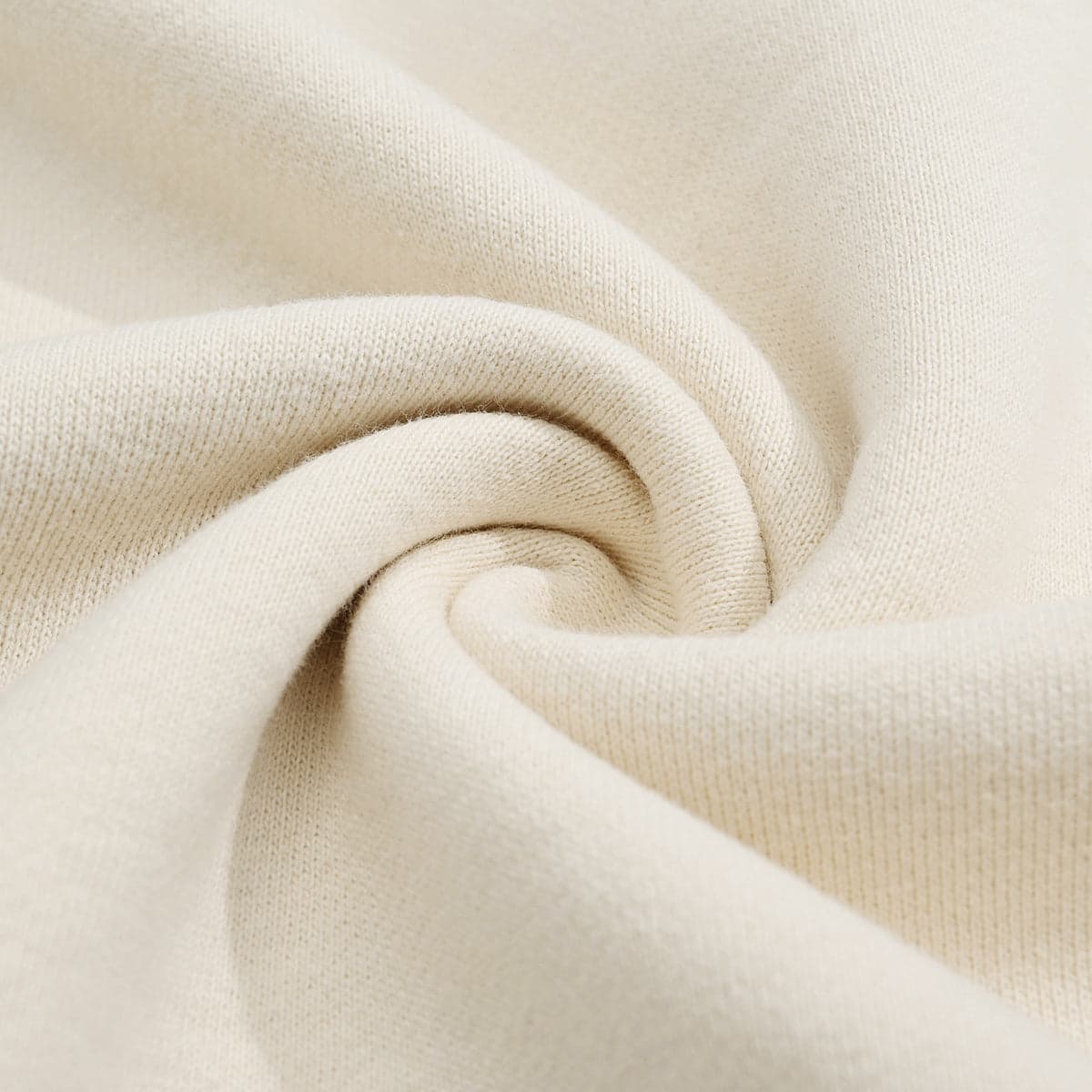 AURACORE graphic half-zip sweatshirt fabric swirl close-up detail