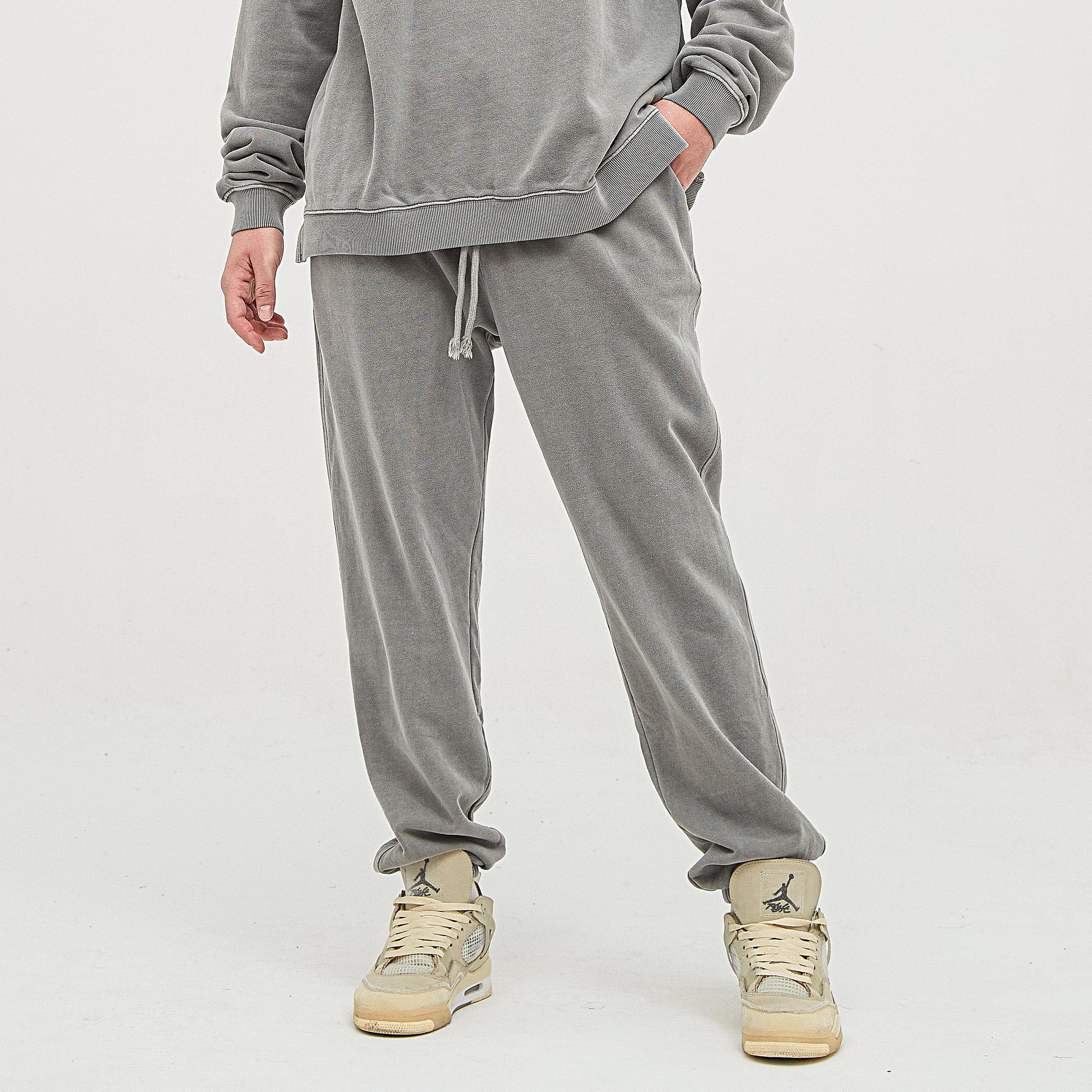 AURIX washed sweatpants front fit view on model with hand in pocket