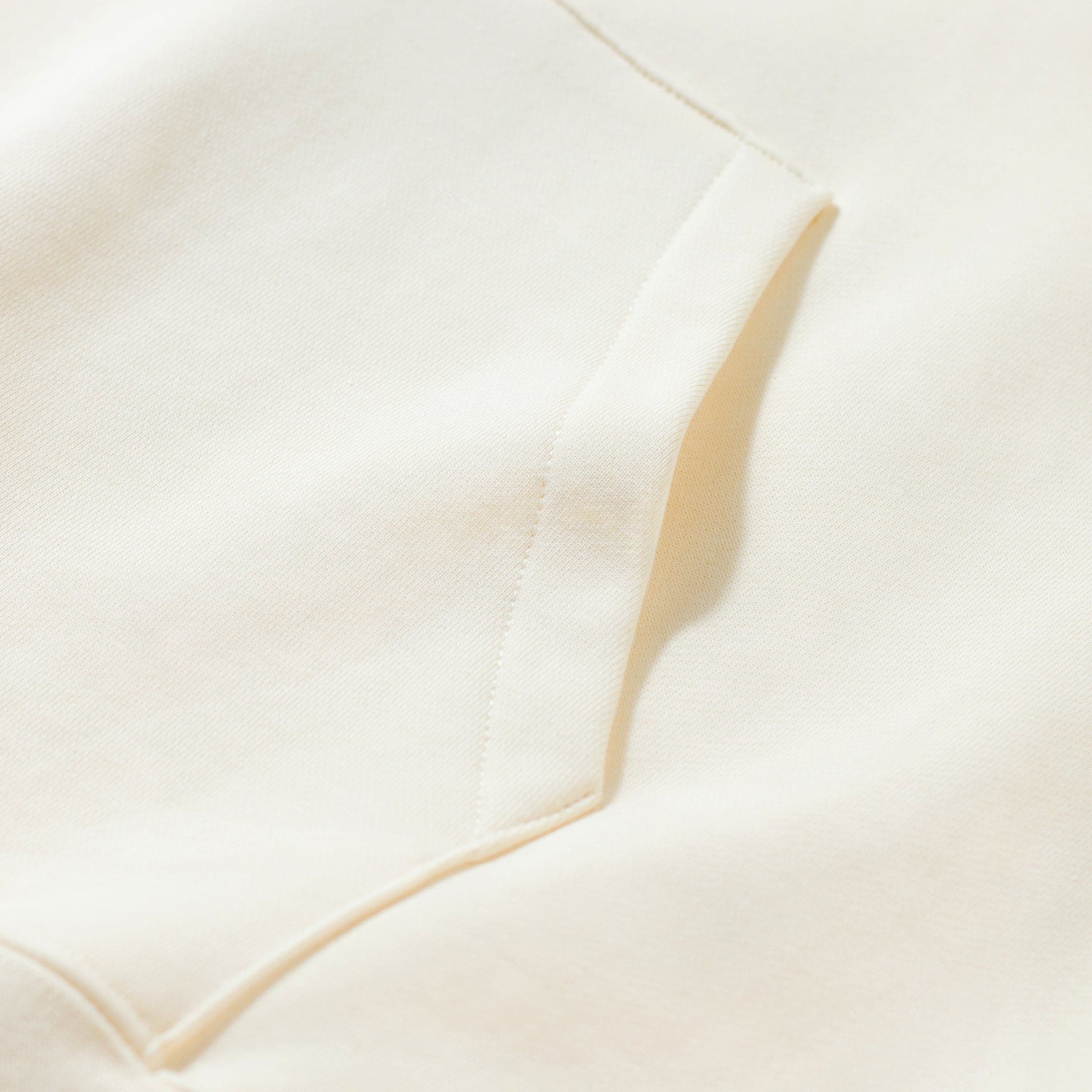 Crownfall oversized graphic hoodie raglan sleeve seam close-up detail
