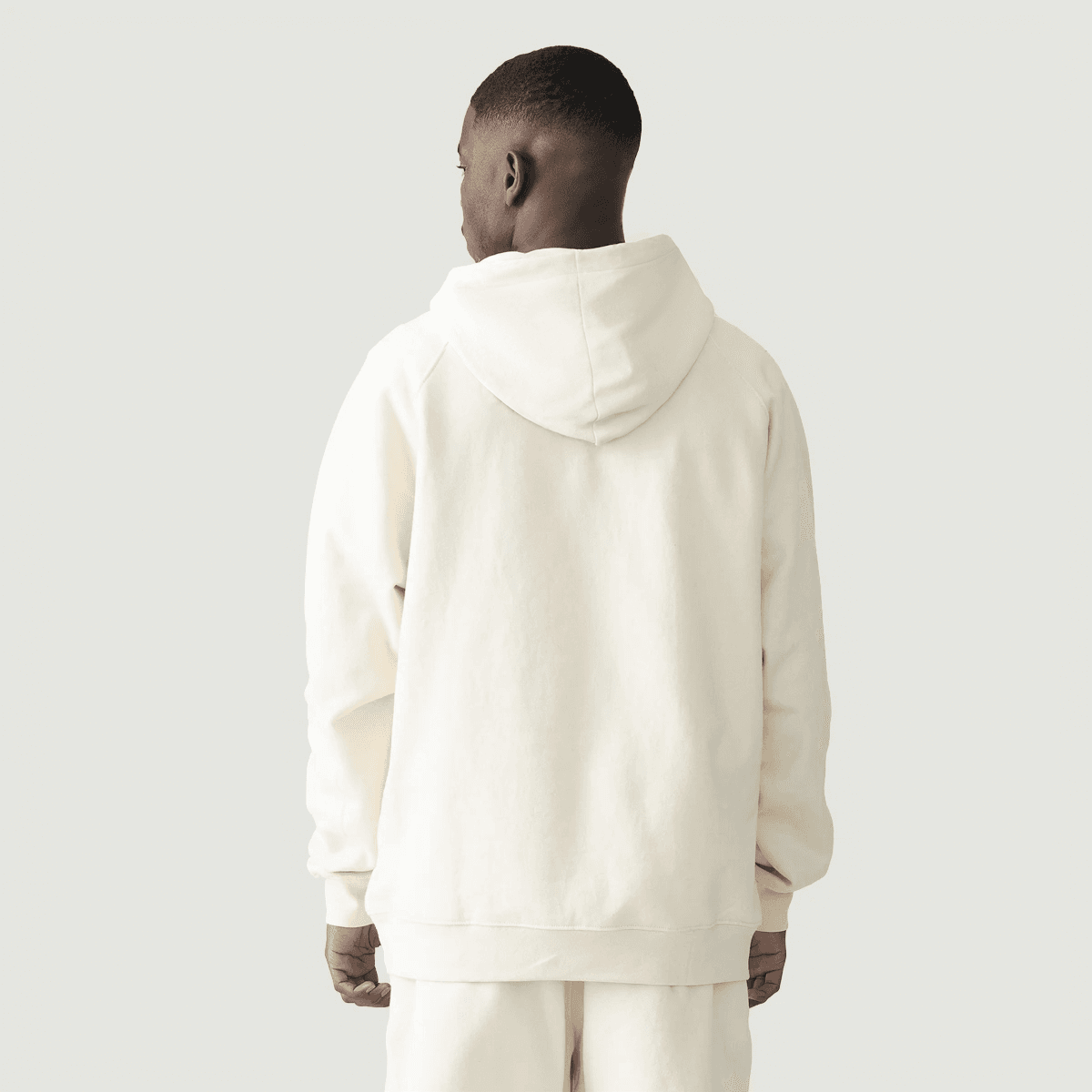Crownfall oversized graphic hoodie male model back fit view