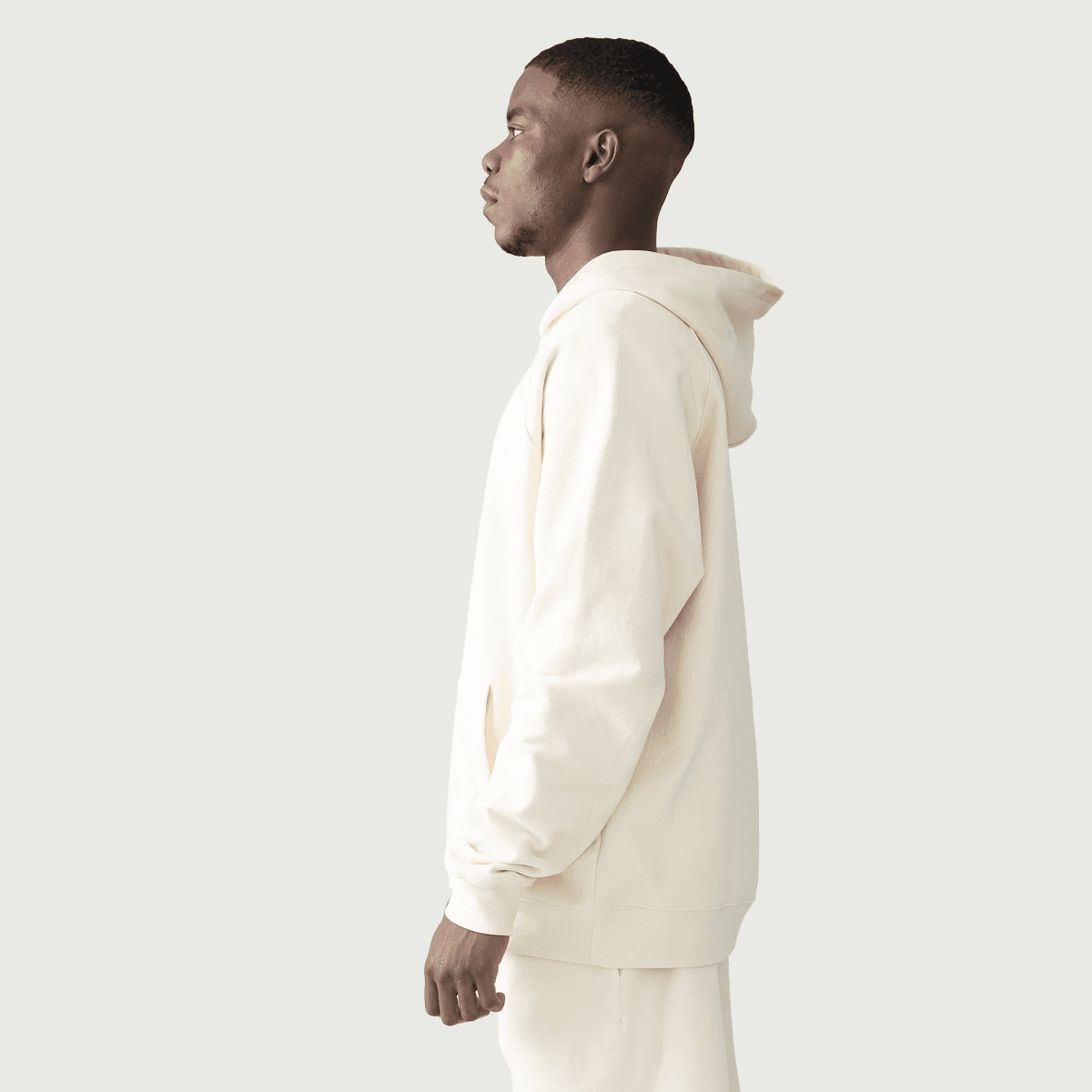 Crownfall oversized graphic hoodie male model side fit view