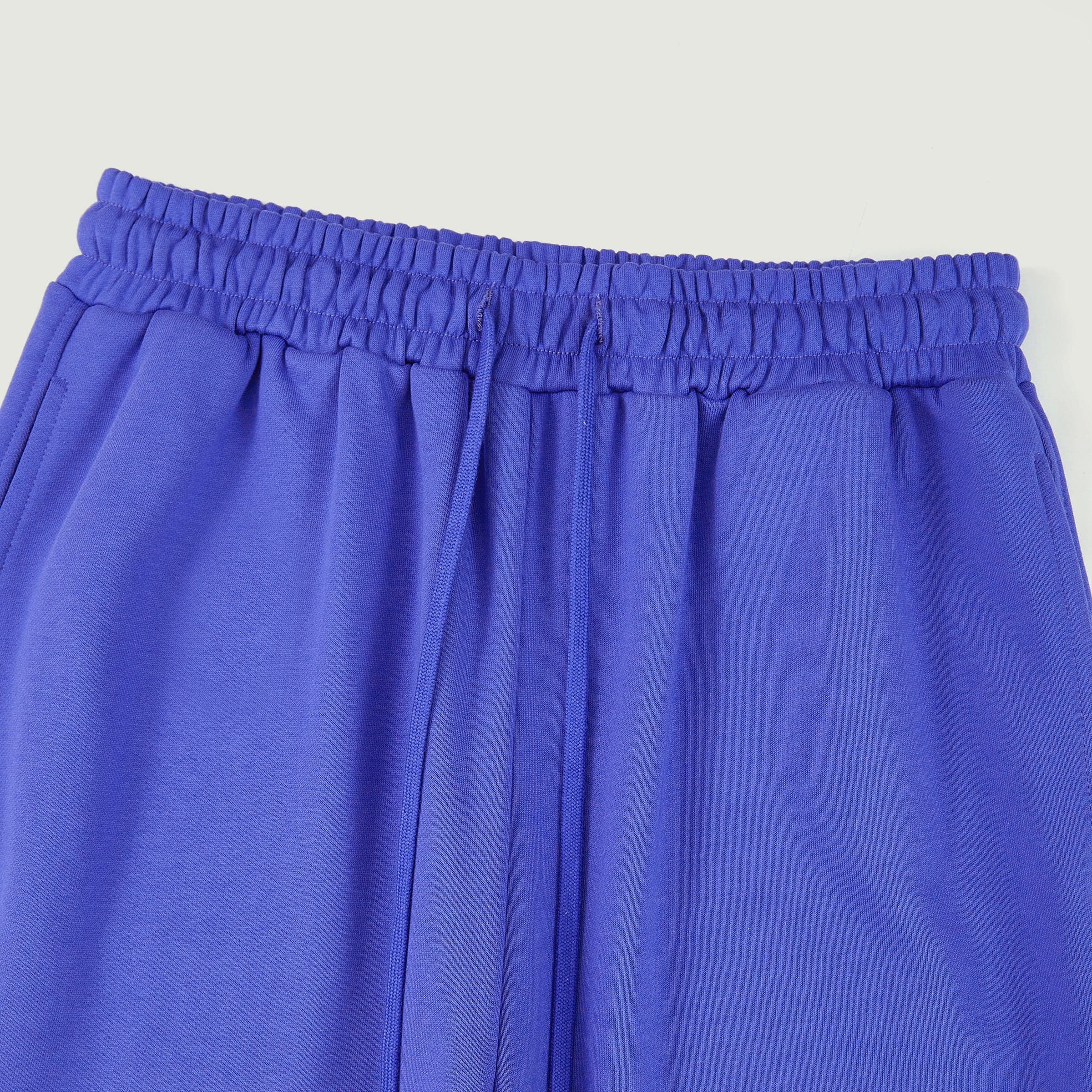 DRGN FLUX media image showing blue sample sweatpants waistband close-up detail