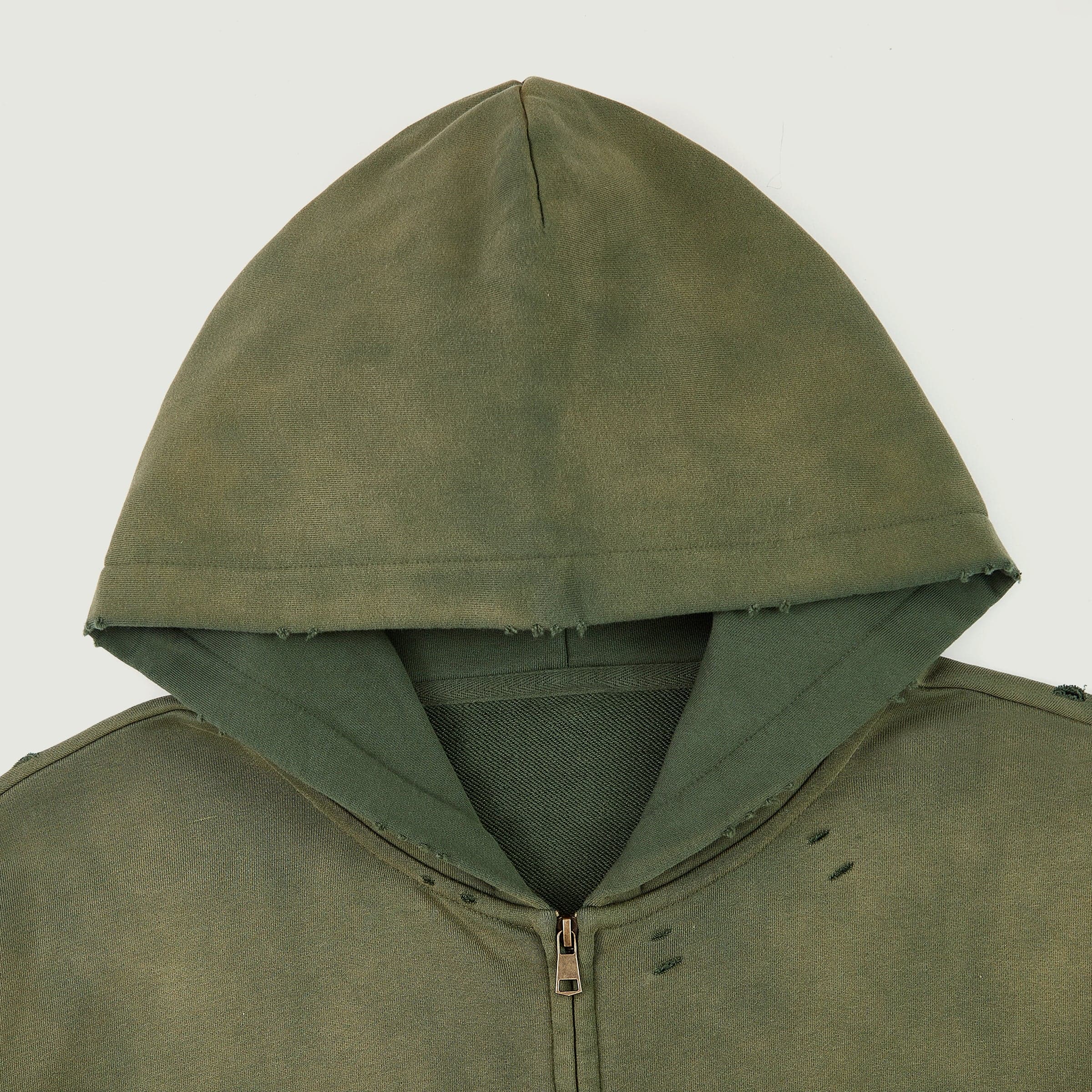 Eternal Wing media image showing green sample zip hoodie hood close-up detail