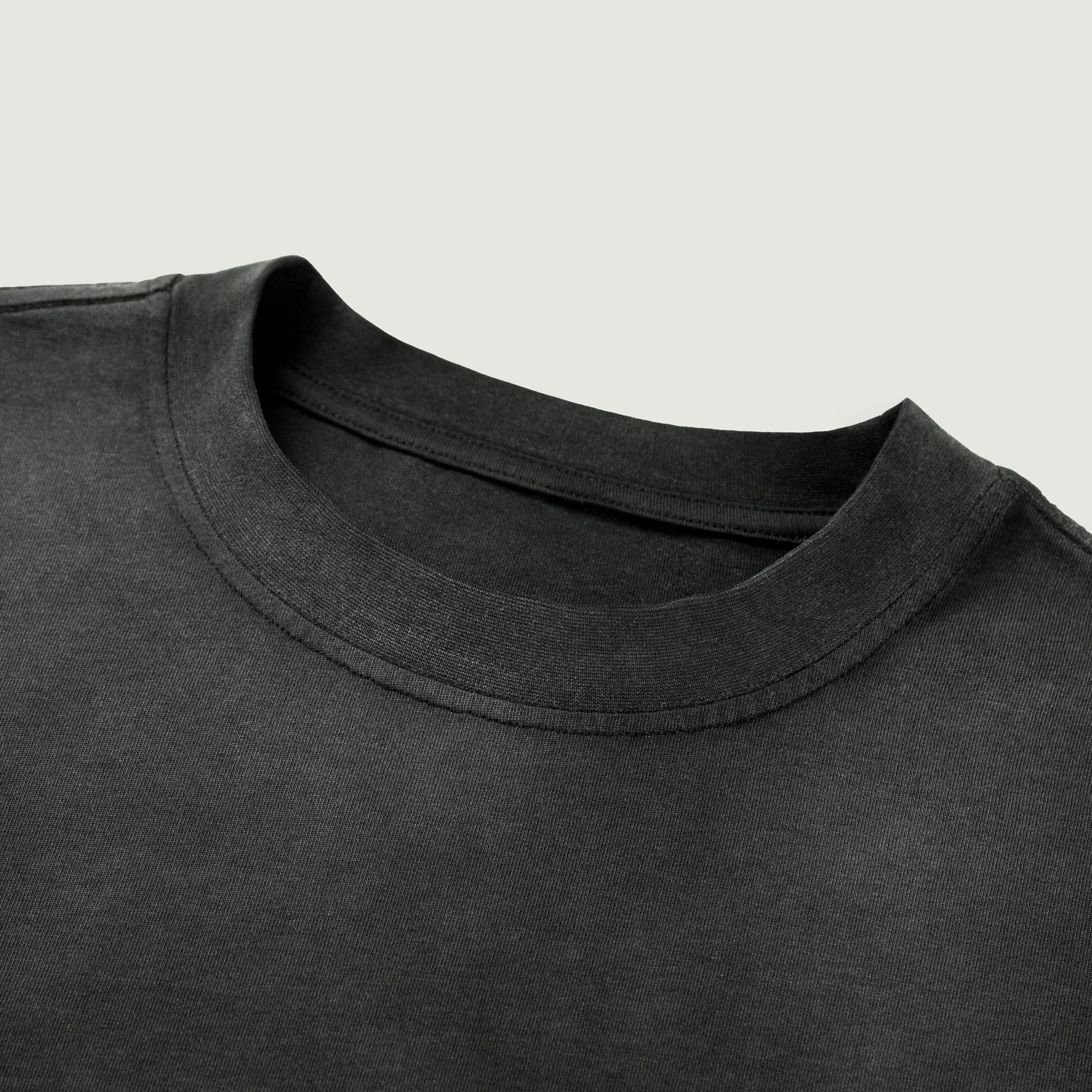 FALLEN GRACE media image showing washed dark grey crewneck collar close-up detail