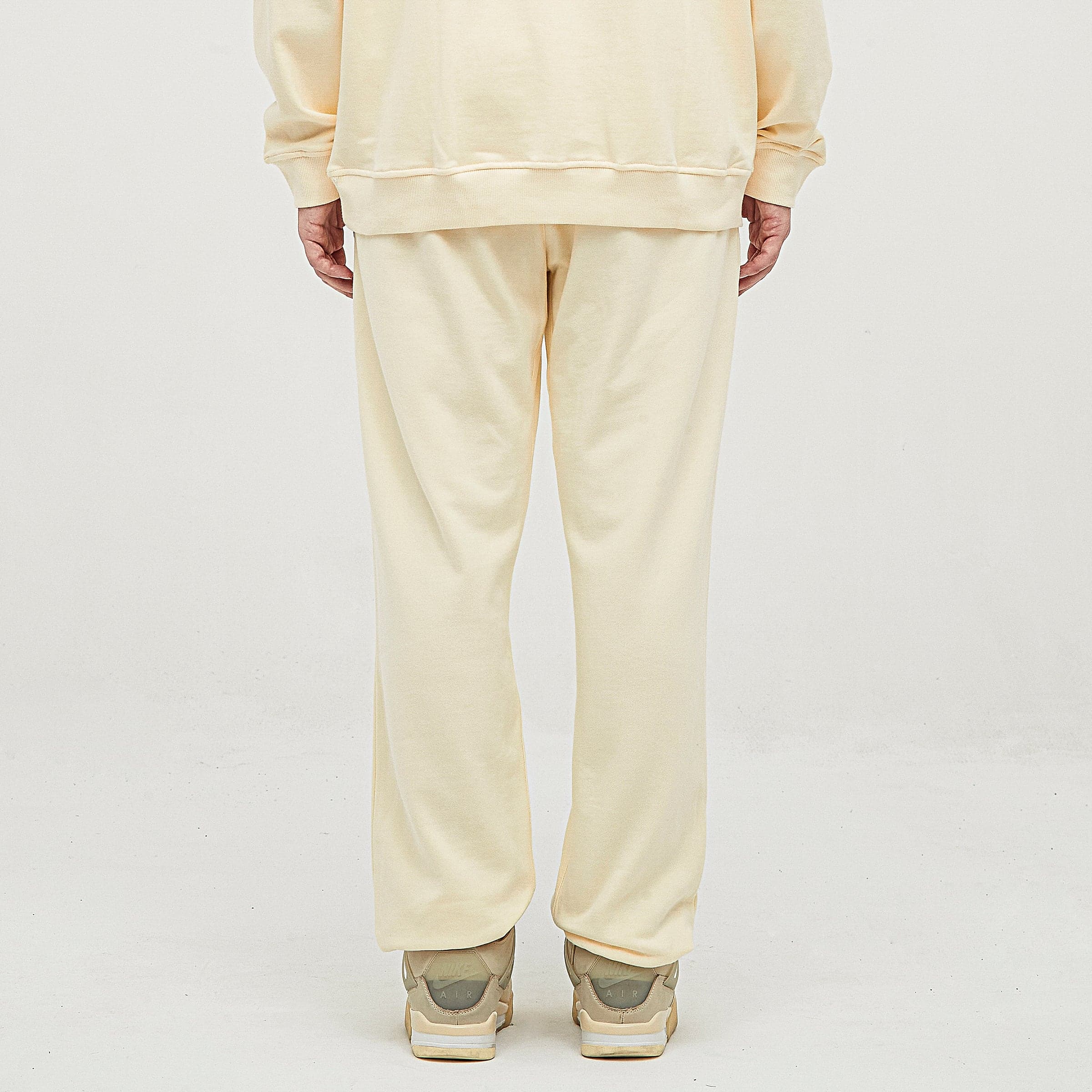 Flora embroidered sweatpants lower leg fit view on model