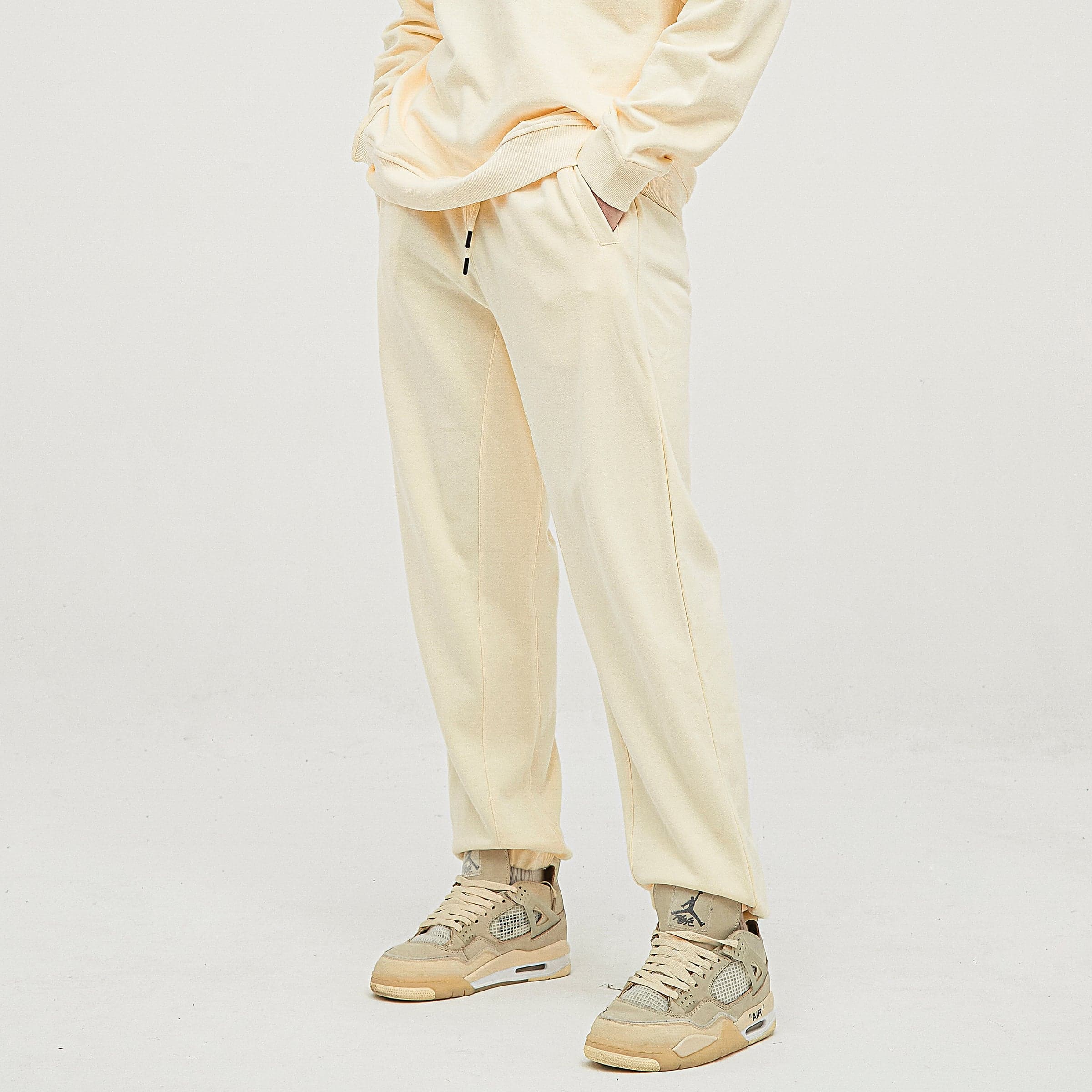 Flora embroidered sweatpants side lower fit view on model