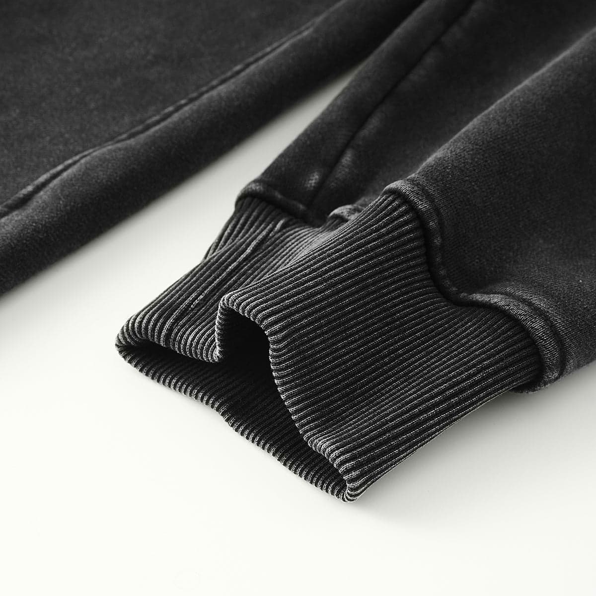 ribbed cuff close up on washed graphic hoodie