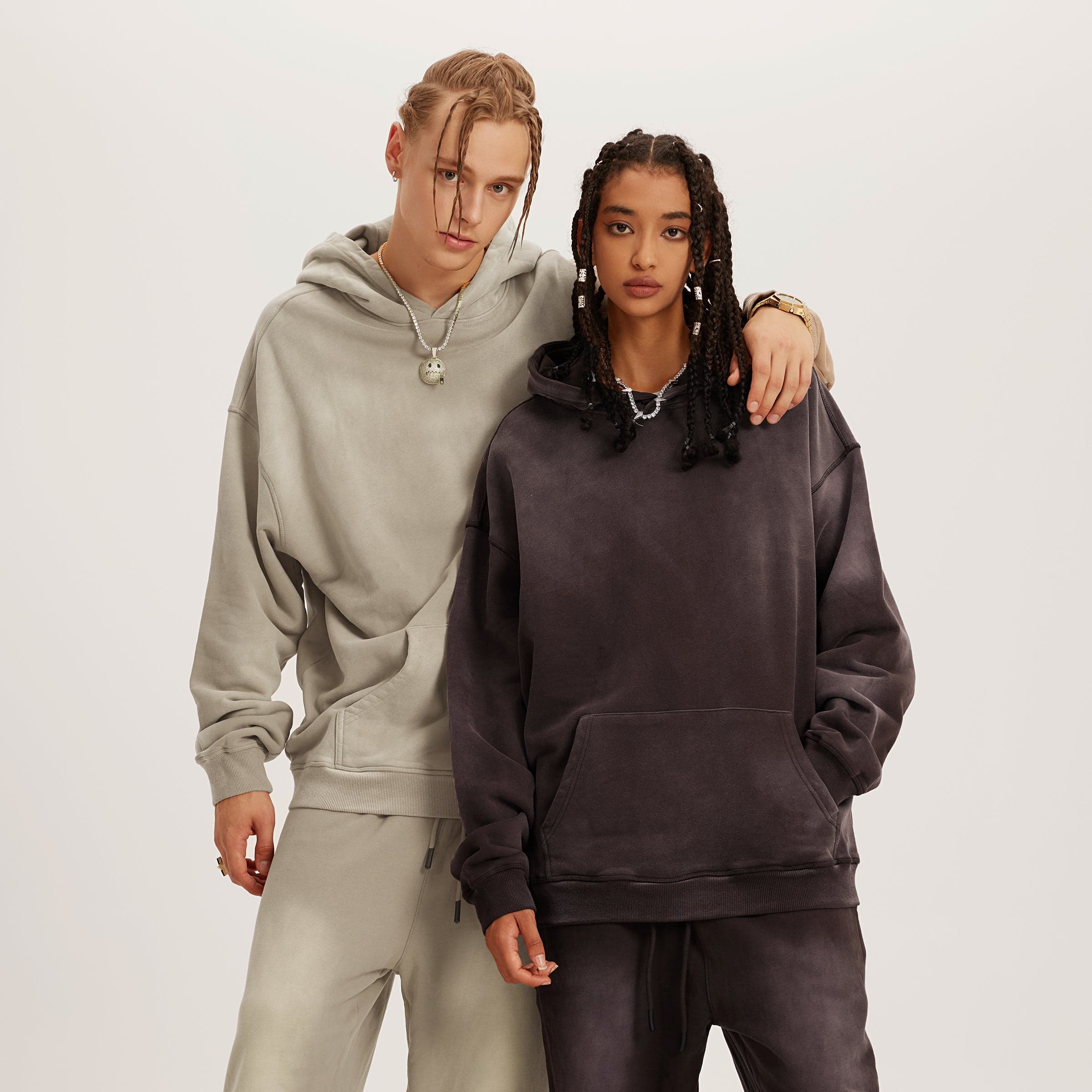 NeoSeraph oversized graphic hoodie lifestyle image with two models in khaki and dark washed hoodies