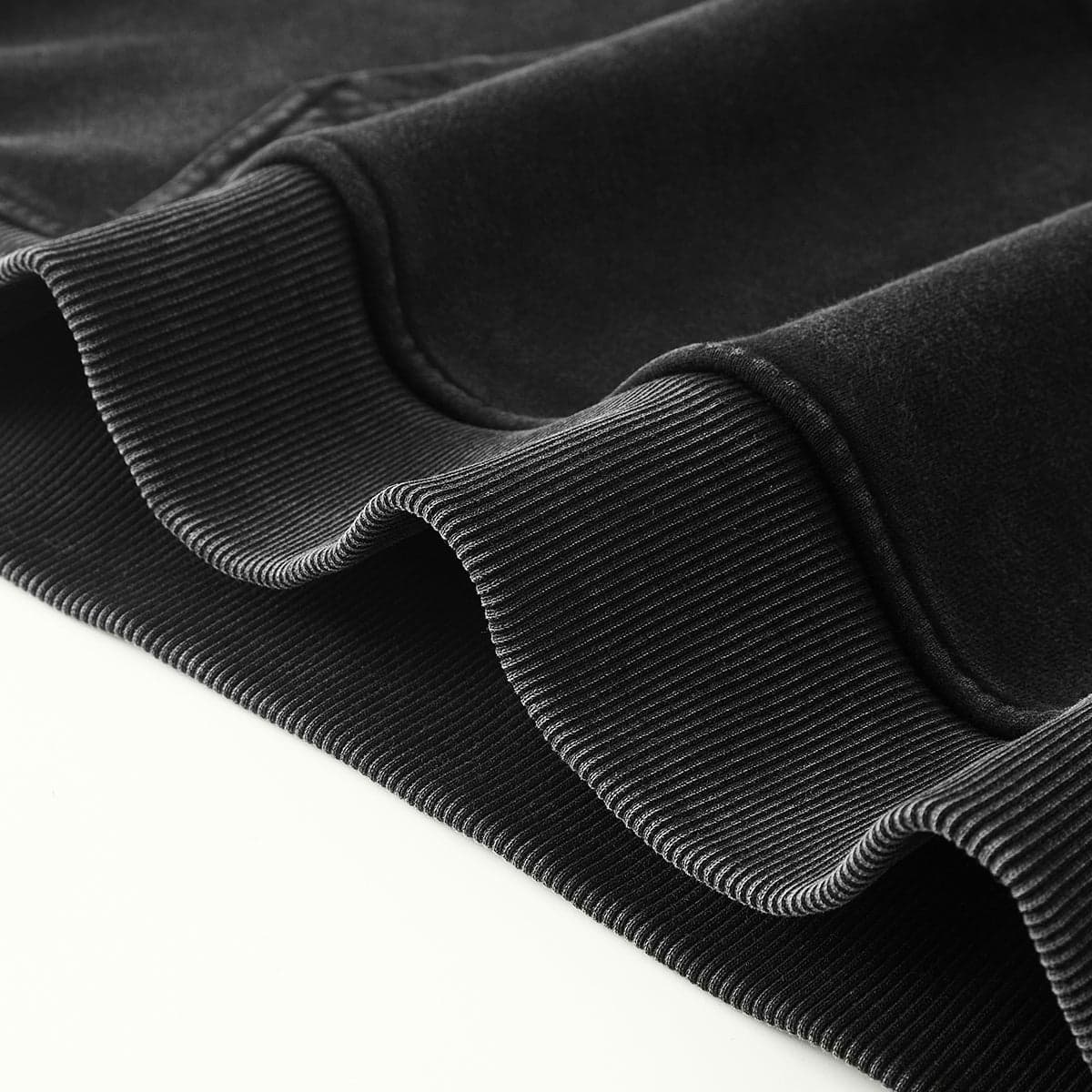 Purple Haze media image showing black hoodie hem and cuff detail