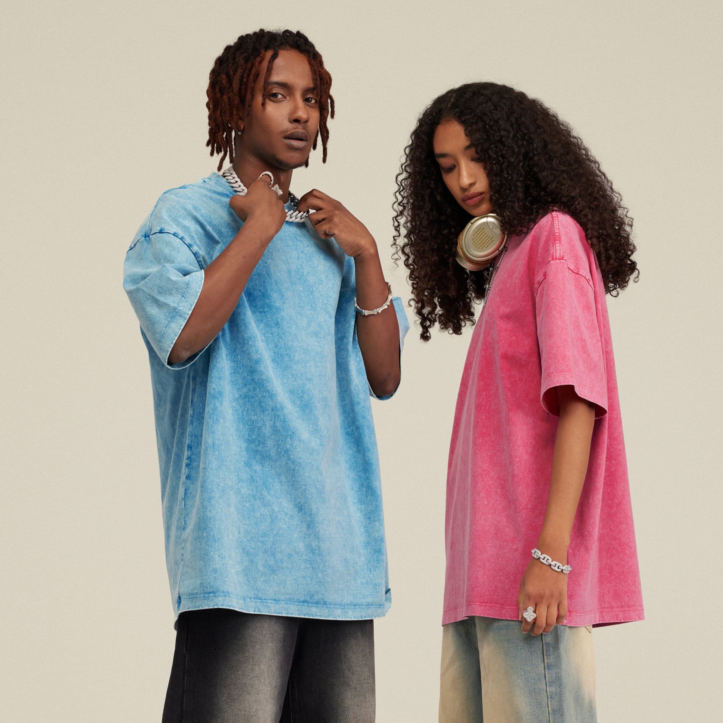 Quantum Veil media image showing blue and pink oversized tees on two models