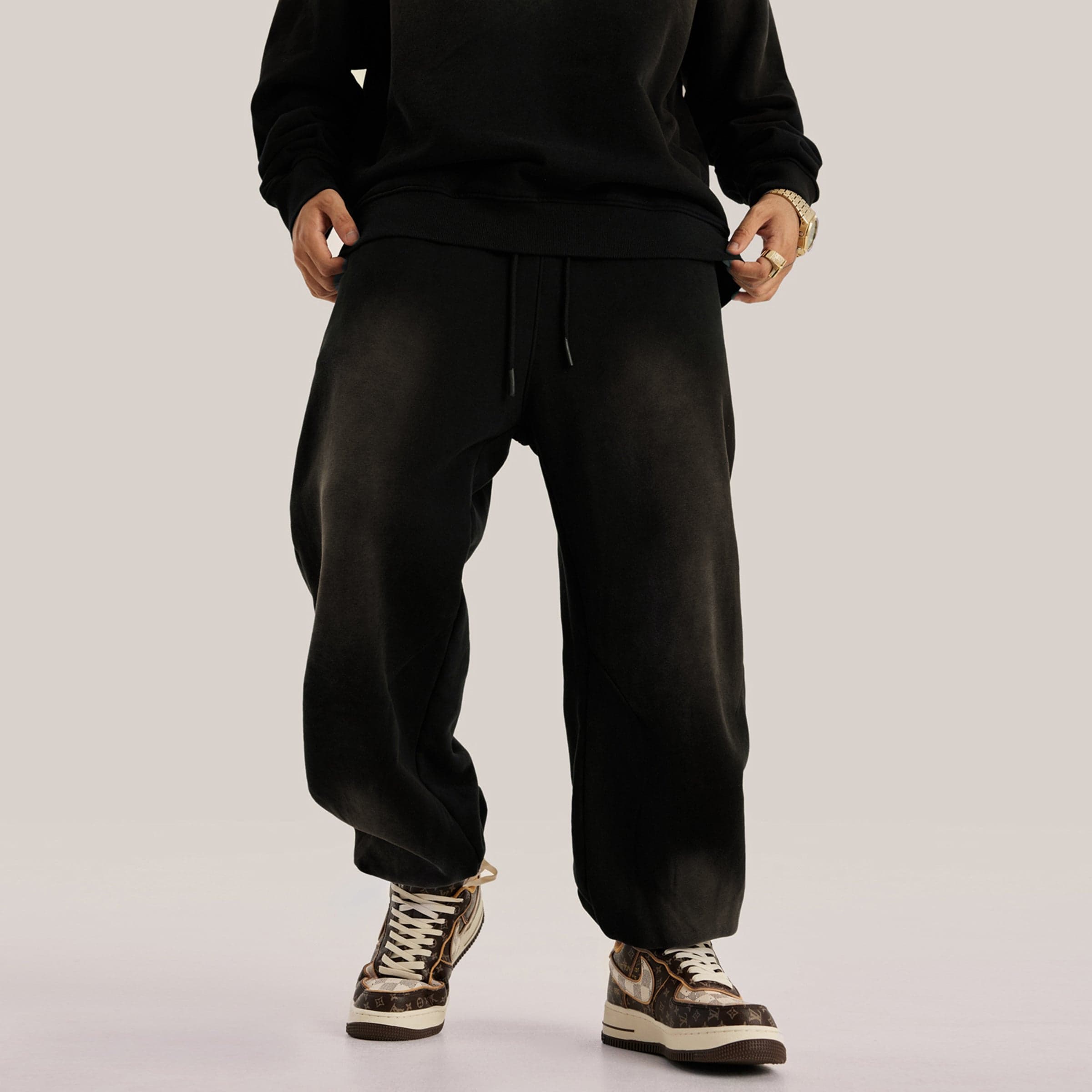 REIGN embroidered sweatpants front lower fit view on model