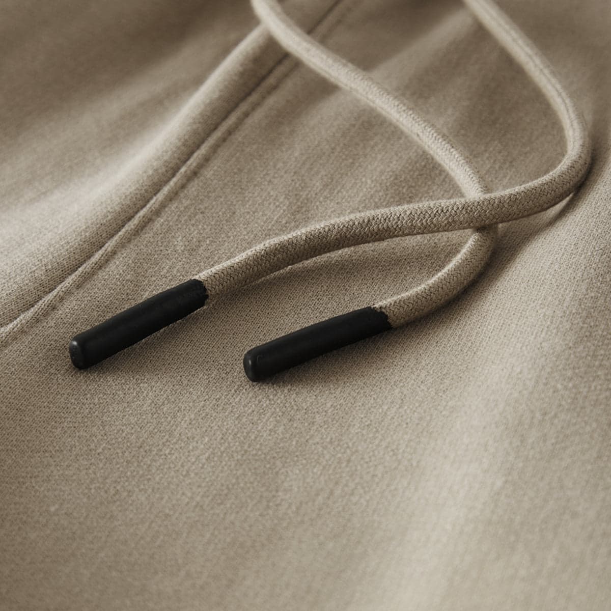 REIGN media image showing beige sample sweatpants waistband close-up detail