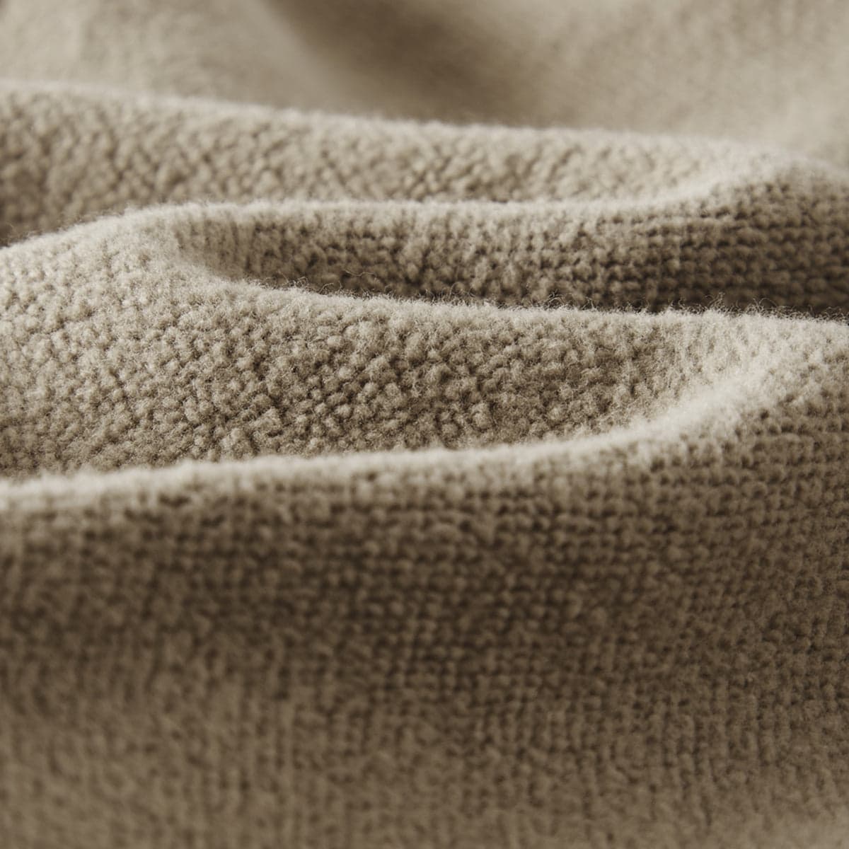 REIGN media image showing beige sample sweatpants side seam close-up detail