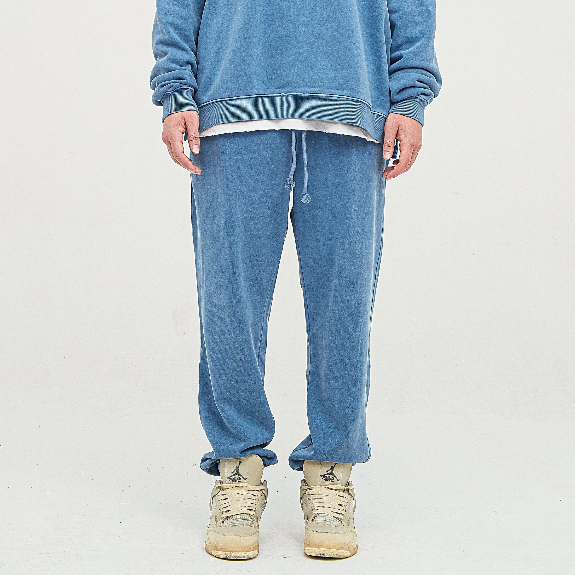 Relic embroidered sweatpants lower leg front fit view on model