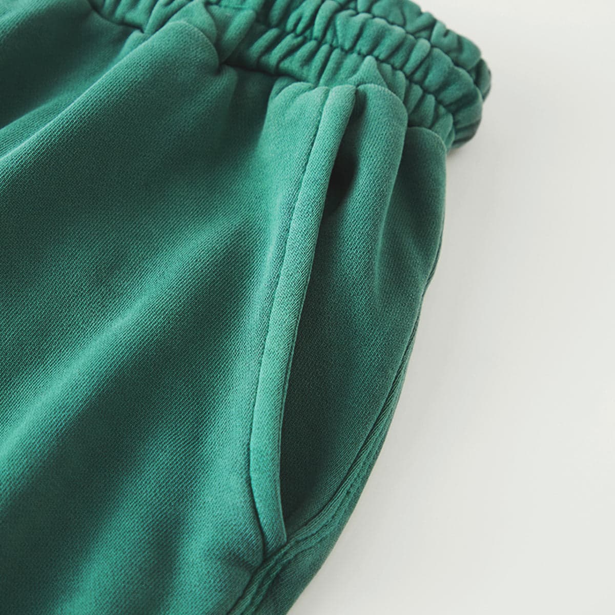 Relic media image showing green sample sweatpants pocket close-up detail