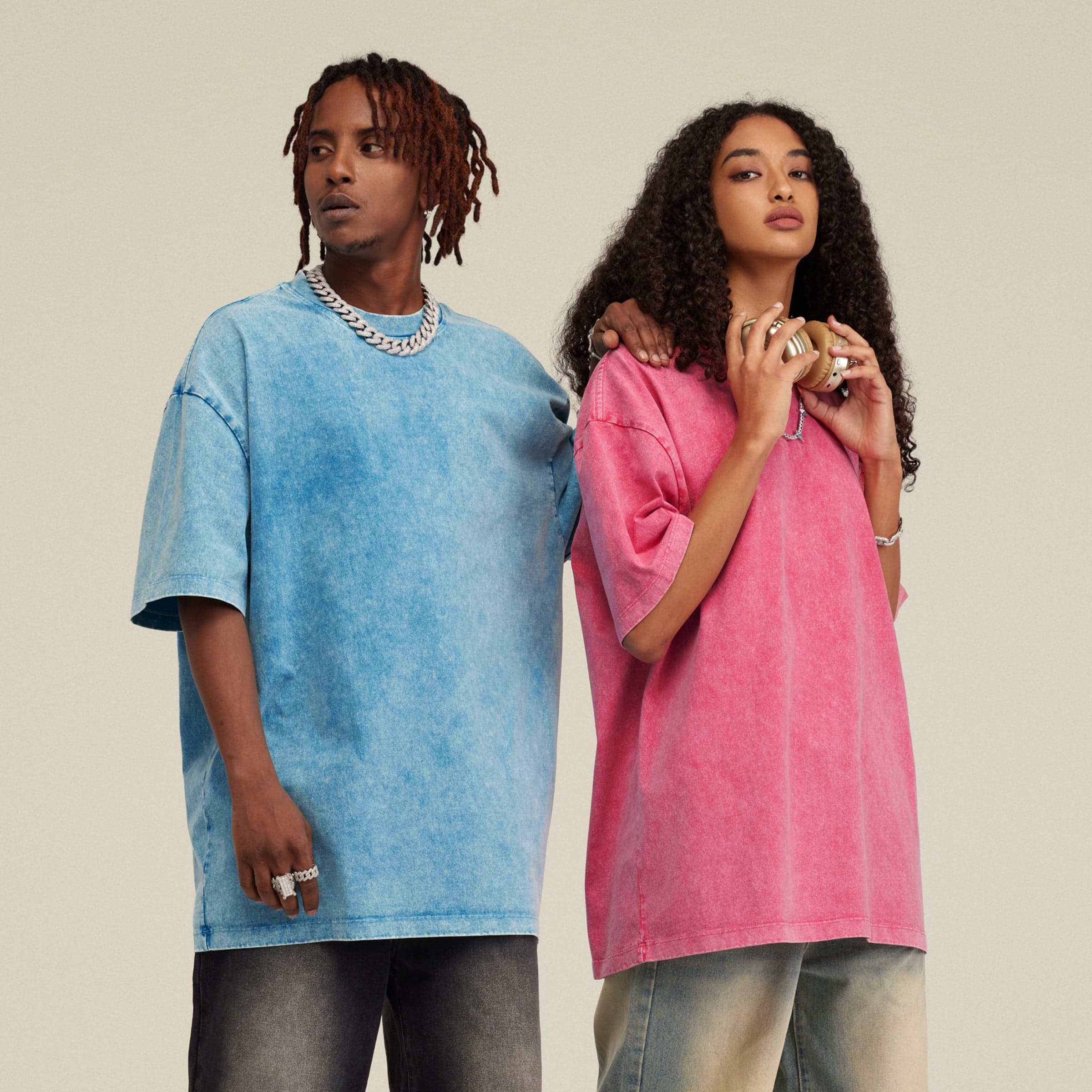 Seraph Coil media image showing blue and pink oversized tees on two models