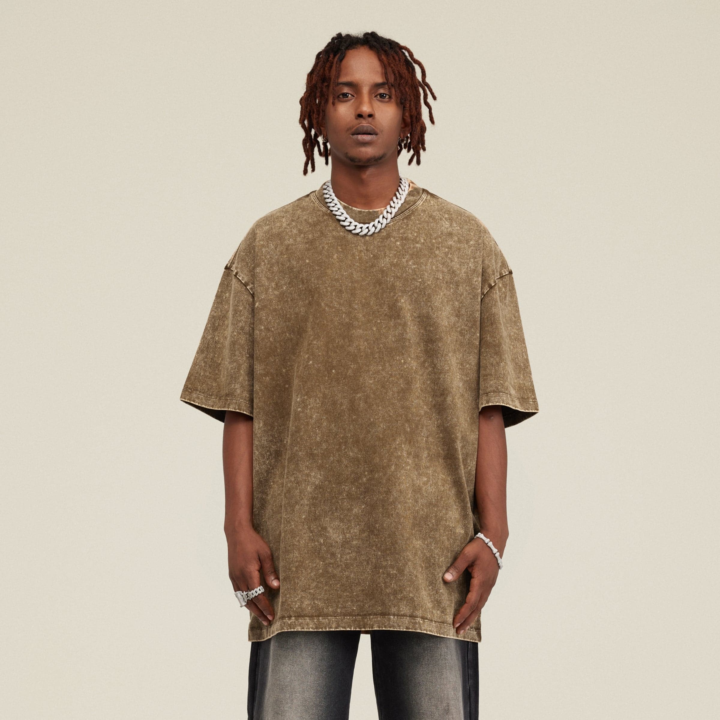 Seraph Coil media image showing male model wearing a brown washed oversized tee front view