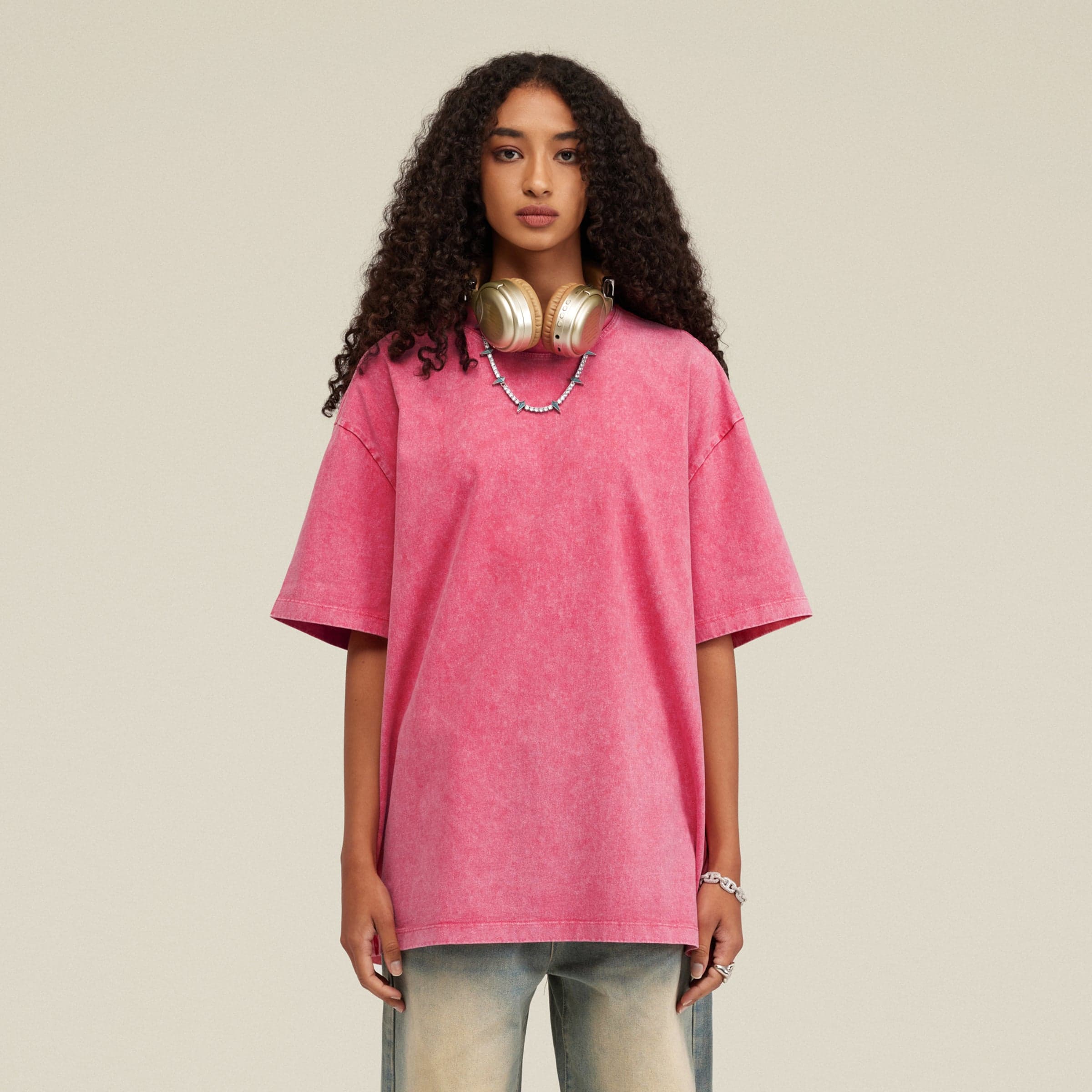 Seraph Coil media image showing female model wearing a pink oversized tee front view