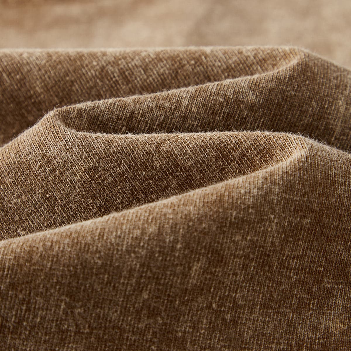 soft washed cotton fabric close up in khaki tone