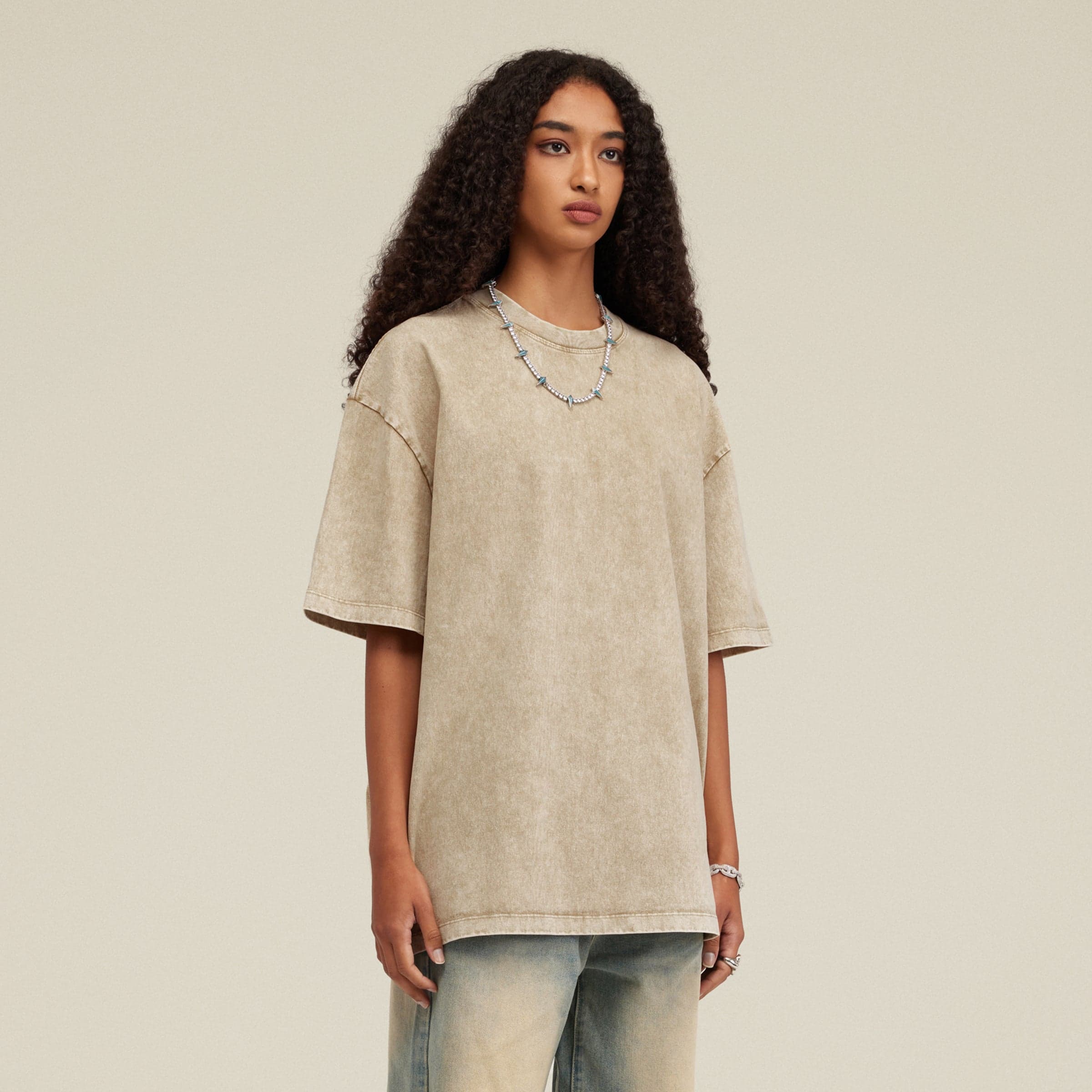 female model wearing khaki oversized washed t shirt full body view