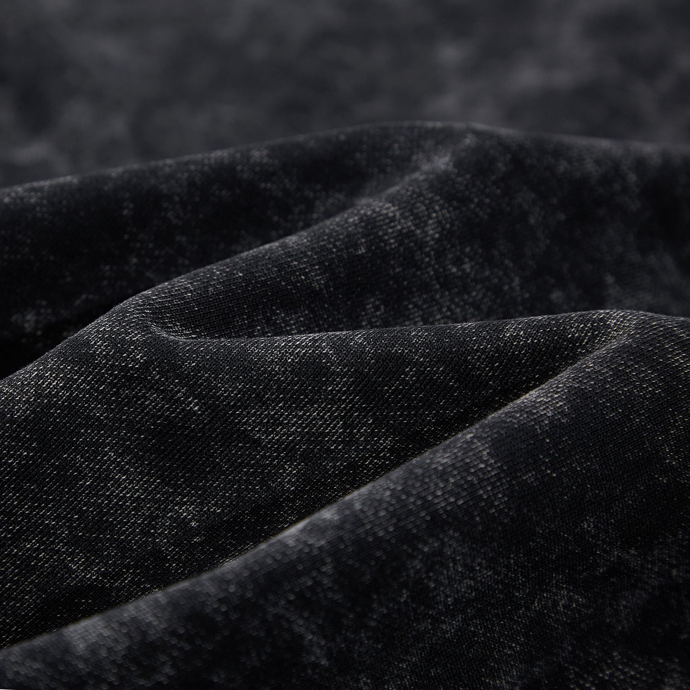 Winged Spear graphic zip up hoodie fabric texture close-up detail in washed black cotton