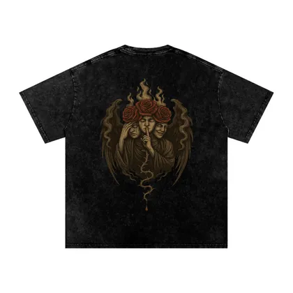 Back design of oversized graphic tee featuring three-faced gothic figure with roses and rising smoke black