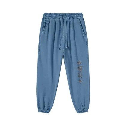 Relic embroidered sweatpants front view in washed blue with leg embroidery